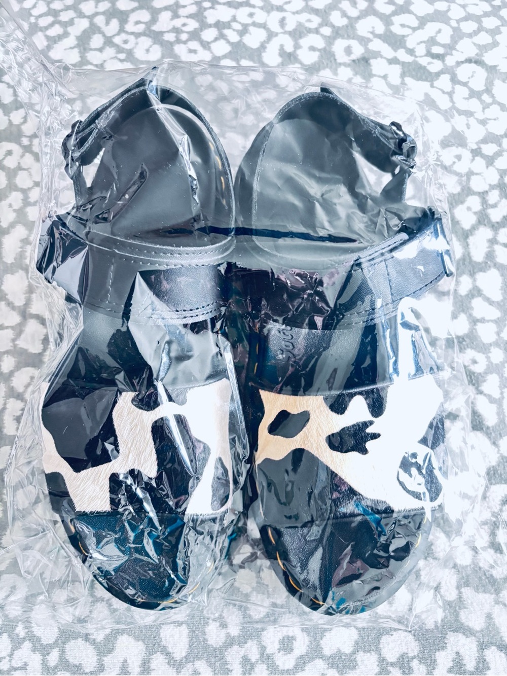 DR. MARTENS BLK/WHT COW VOSS HAIR ON SANDAL, size 9